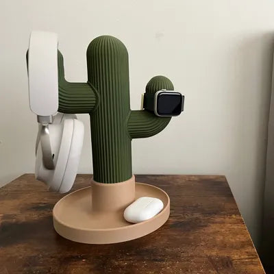 Cactus Headphone and Watch Stand holding headphones and a watch