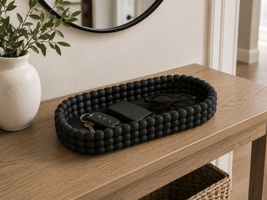 Beaded Oval Tray holding sunglasses and keys by the front door