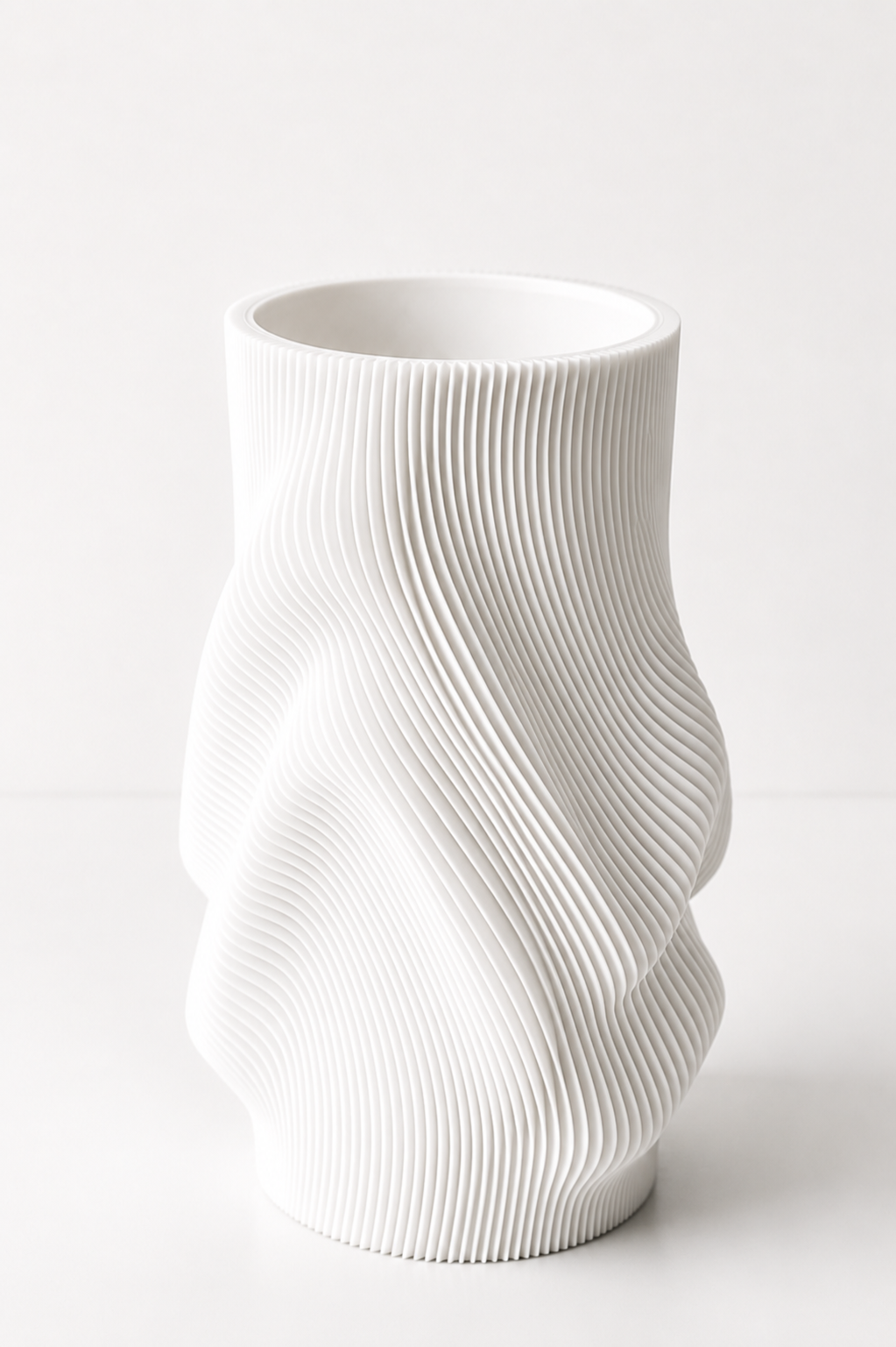 Swirl Vase full silhouette shown empty on a console